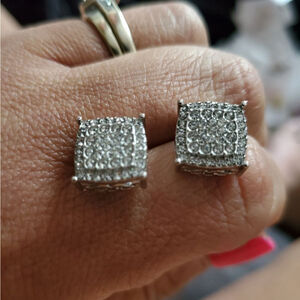 Square stud silver earrings.
